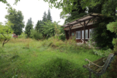 Bild - Bauen Sie Ihr Haus zwischen Apfelbäumen, Tannen und Holunderblüten
